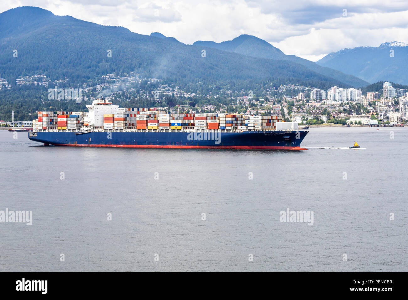 The container ship Seamax Stratford coming into the harbour at Vancouver, British Columbia, Canada Stock Photo