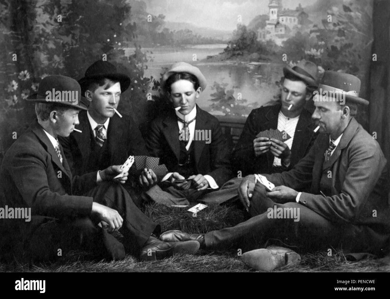 AMERICAN CARD PLAYERS on a postcard about 1910 Stock Photo