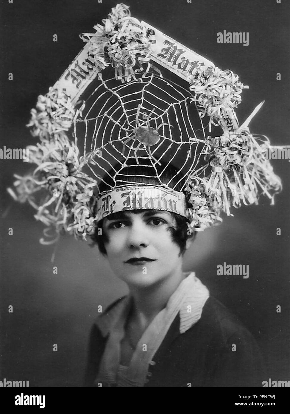 LE MATIN A promotion in the form of a hat made from its pages for the French newspaper about 1910. Le Matin originally sponsored the Tour de France  as a promotional vehicle. Stock Photo