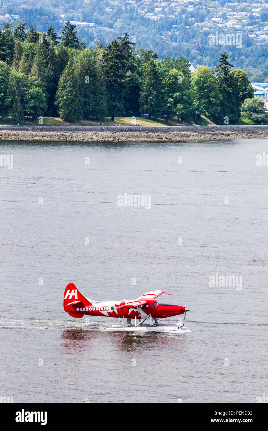 Seaplane C-FODH, a De Havilland DHC-3T Vazar Turbine Otter, taking tourists for a pleasure flight from the harbour at Vancouver, British Columbia, Can Stock Photo