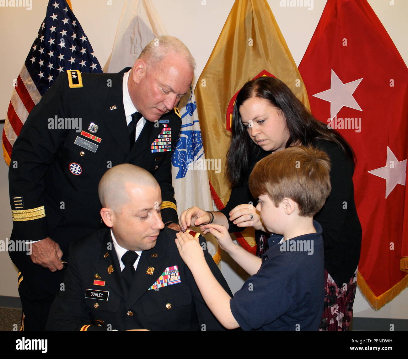 Capt. (P) Benjamin Cowley, a native of Logan, Utah, was promoted to major by the 377th TSC commander, Maj. Gen. Les Carroll during a ceremony at the Frank J. Uddo Reserve Center Jan. 7. In attendance was Maj. Cowley’s family, wife Lexi, son Truxton, and daughter Jocelyn. Congratulations to Maj. Cowley and his family on this momentous occasion. (Army photo/Spc. Sye Ellis) Stock Photo