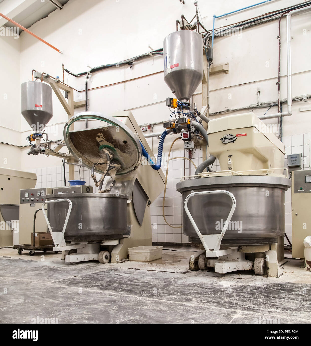 https://c8.alamy.com/comp/PENF0M/johannesburg-south-africa-9-march-2015-industrial-bread-dough-mixers-in-bakehouse-PENF0M.jpg