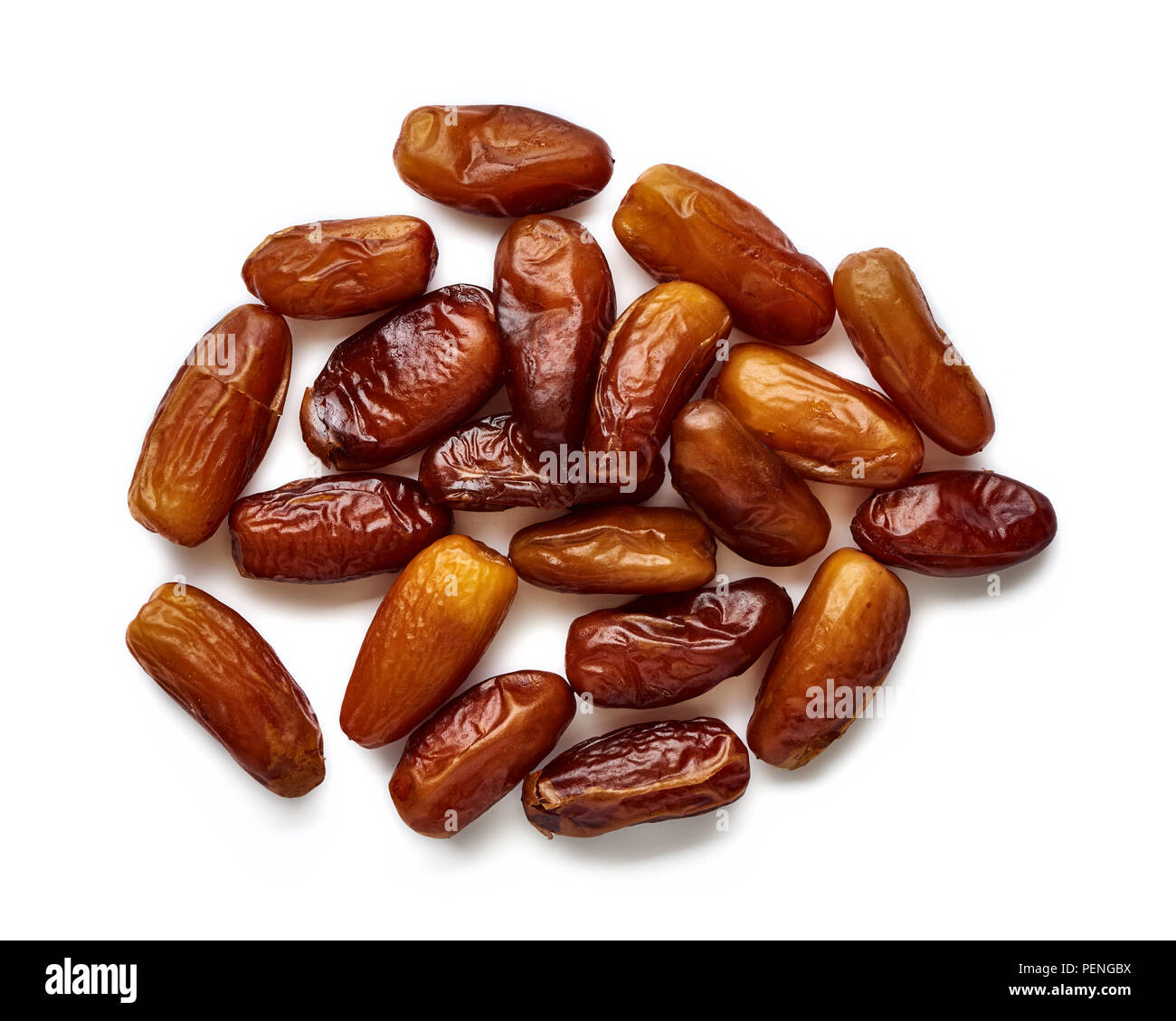 Heap of dried dates isolated on white background. Top view. Stock Photo