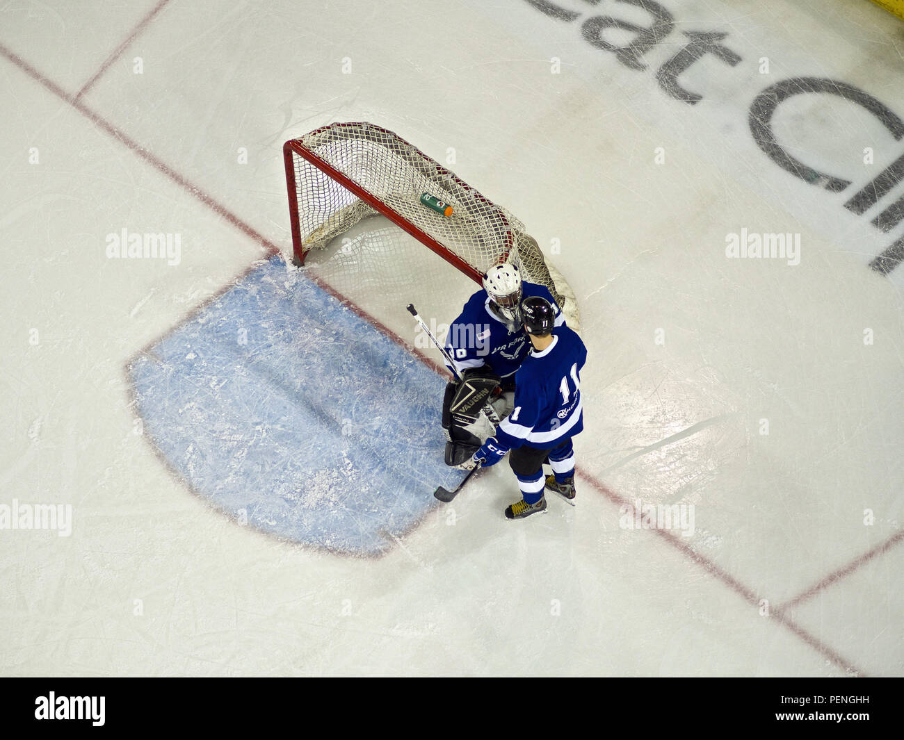 Capt. Stephen Ludwig (right), JBER Air Force Hockey Team captain