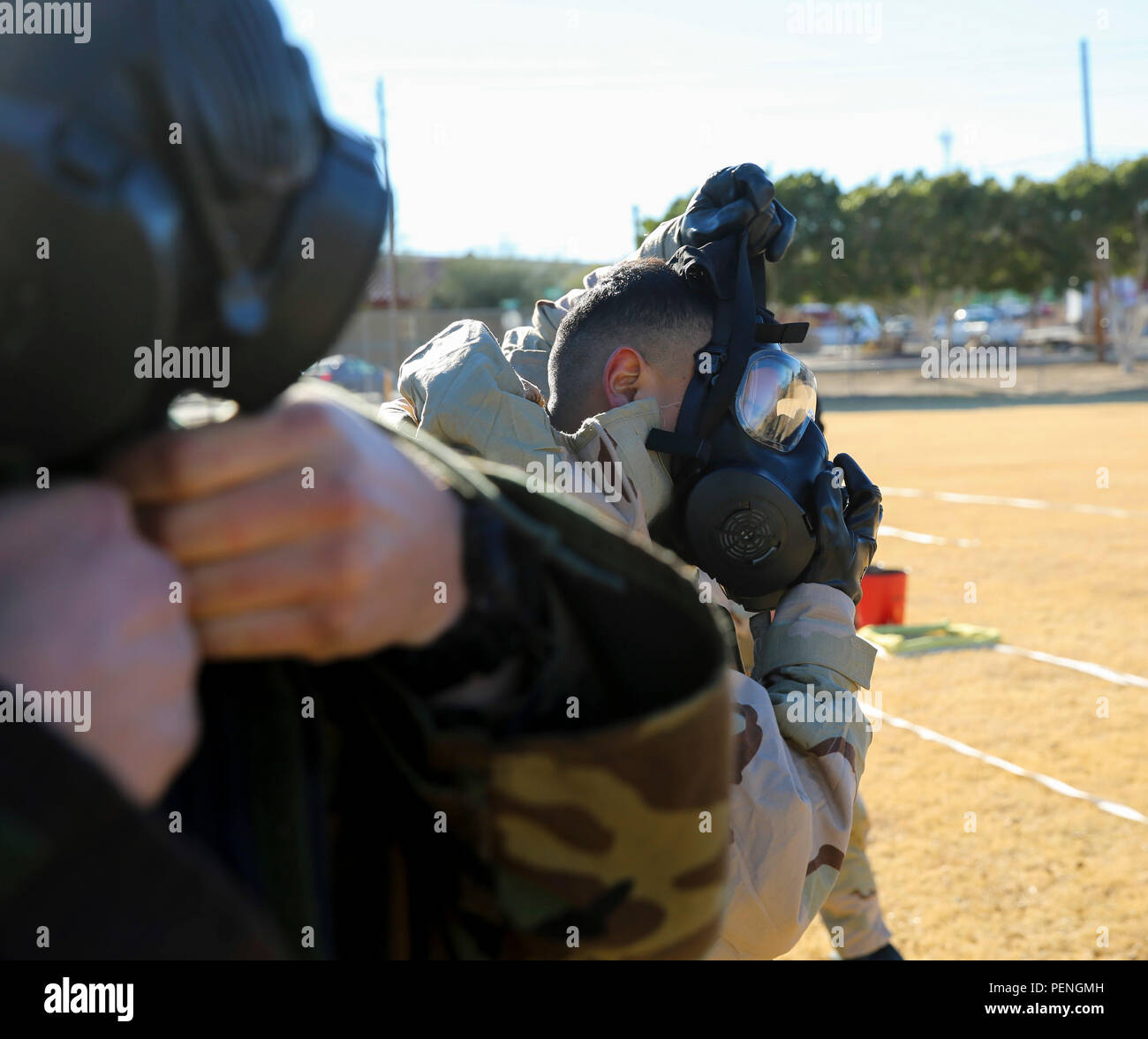 Marines with Marine Wing Support Squadron 371 don Mission Oriented Protective Posture (MOPP