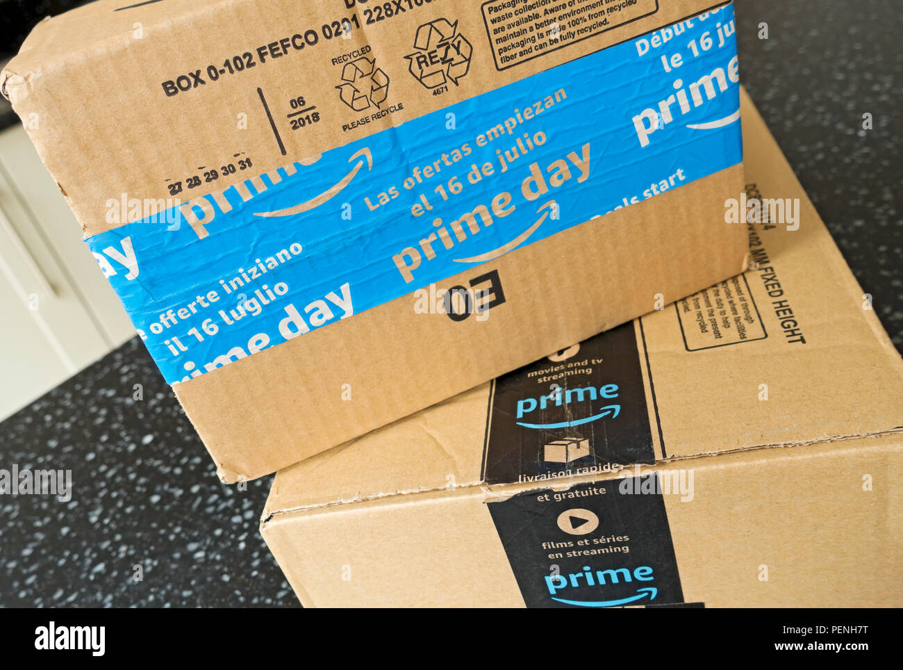 Close up of Amazon prime box boxes packages package home internet shopping delivery order England UK United Kingdom GB Great Britain Stock Photo
