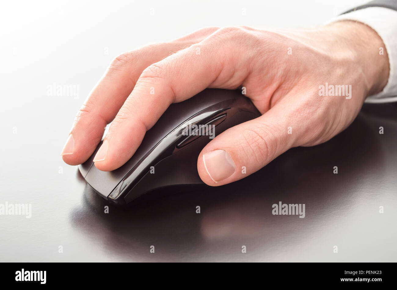 Man using a black mouse hi-res stock photography and images - Alamy