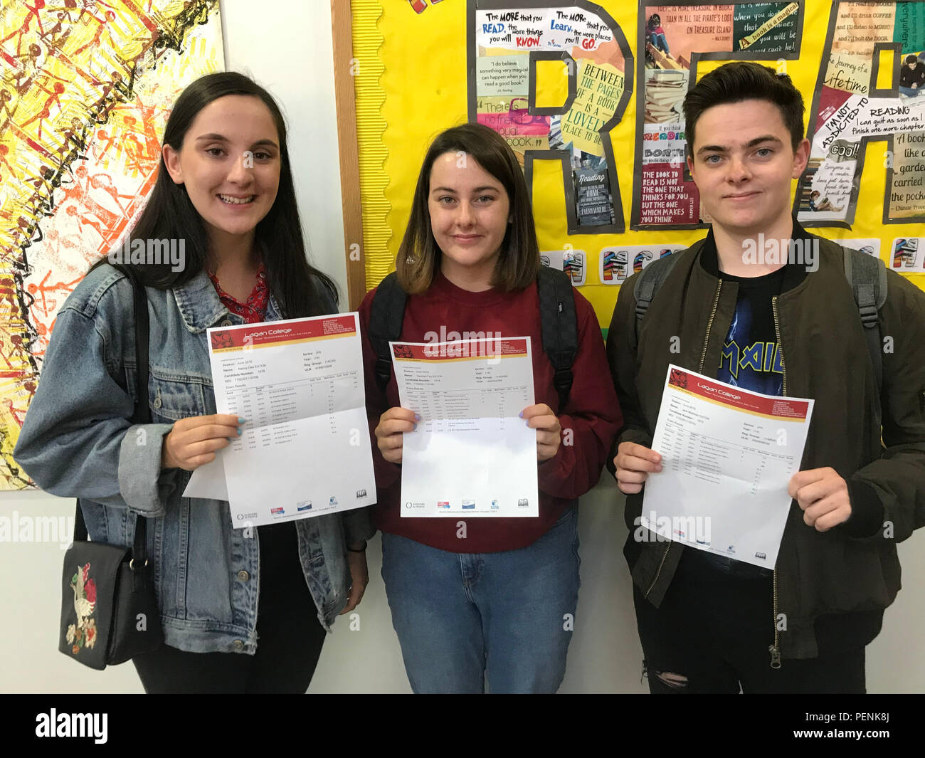 Triplets Nancy, Hannah and Jack Eaton, from Belfast, who all got two Bs and one C at Lagan College, Belfast, as students across the country received their A Level results on Thursday. Stock Photo