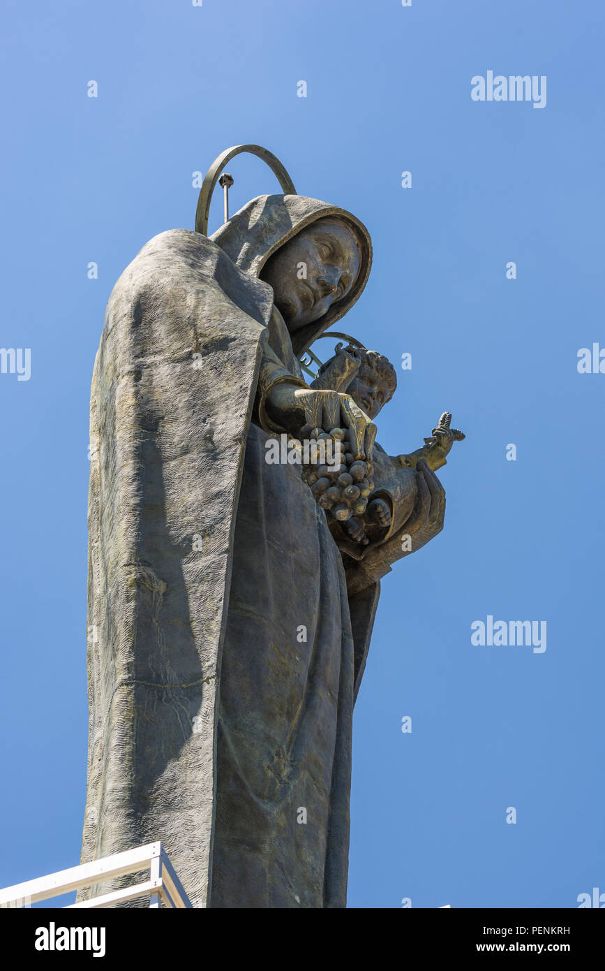 Bronze statue of Our Lady of the Bekaa, a Virgin Mary sculpture on a tower dominating Zahlé, Lebanon Stock Photo