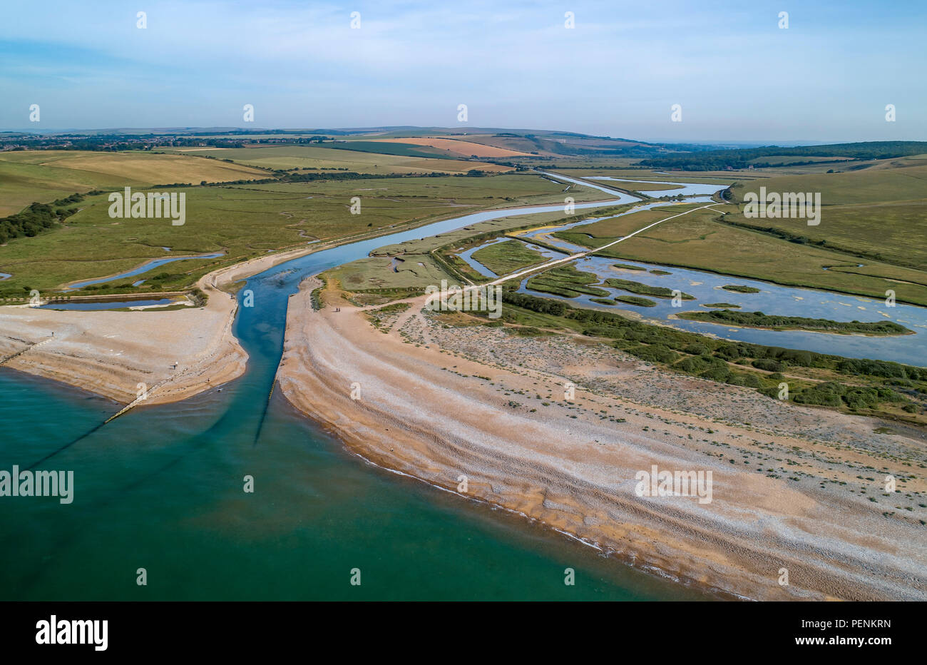 Drone photo over Cuckmere Beach with Seven Sisters Country Park in the background Stock Photo
