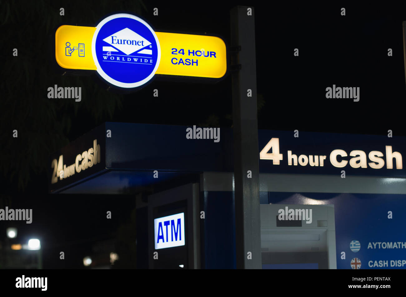 Kolymbia, Rhodes island, Greece - 21 September 2017: ATM open 24 hours with night illumination Stock Photo