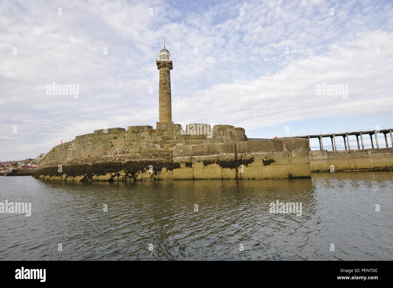The west lighthouse on the west pier at the entrance to Whitby Harbour, north Yorkshire, UK. Stock Photo