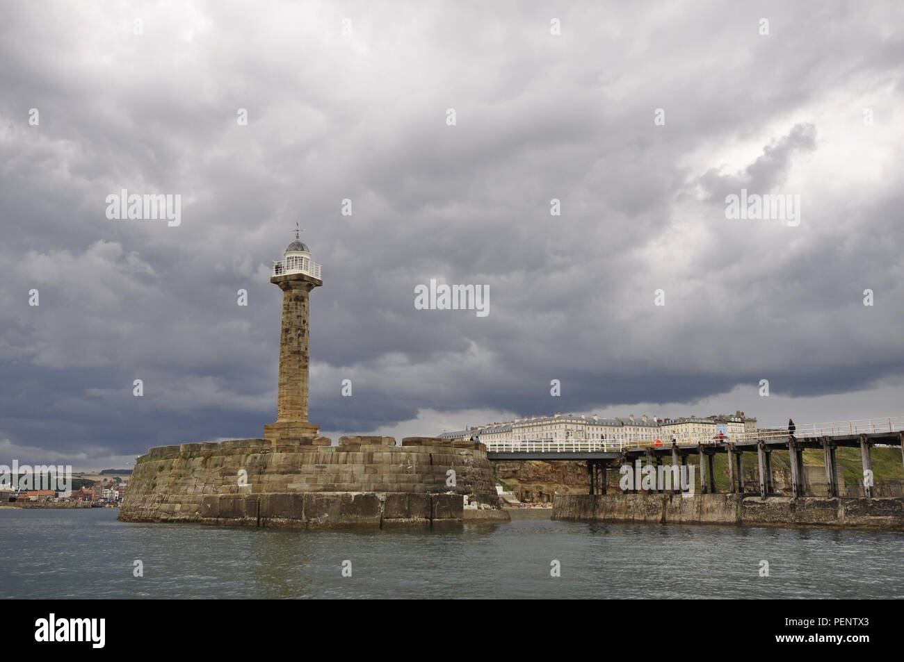 The west lighthouse on the west pier at the entrance to Whitby Harbour, north Yorkshire, UK. Stock Photo