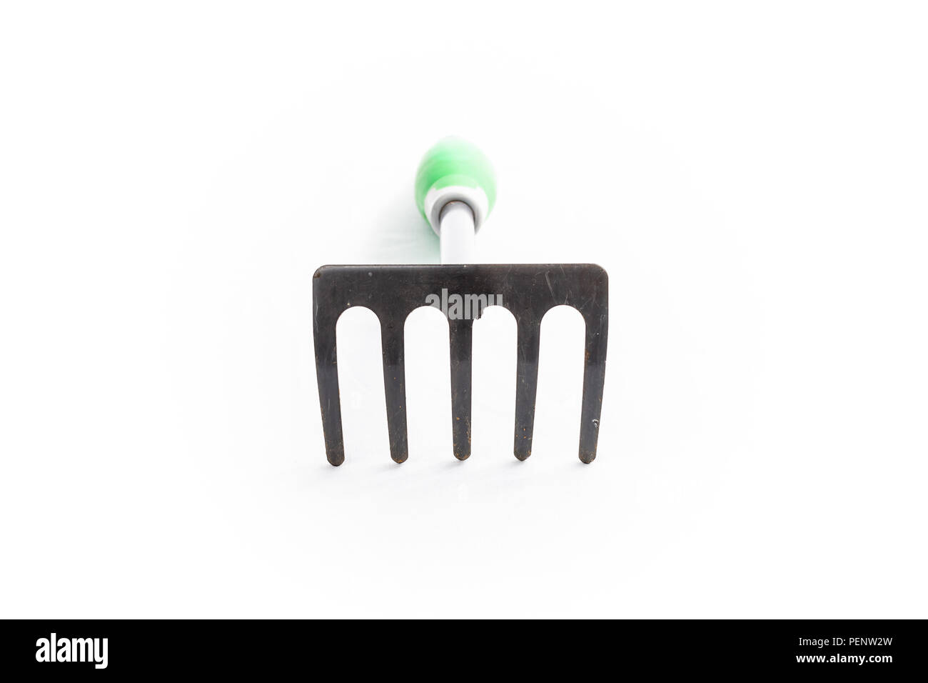small rake gardening 5 teeth with green handle on white background ...