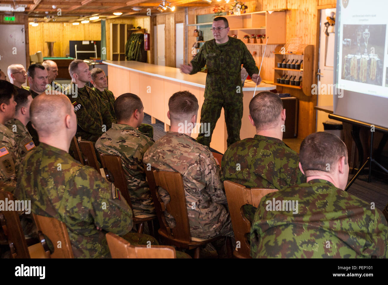 Command Sgt. Maj. Linas Anskaitis, the senior enlisted adviser for the Lithuanian Land Forces Mechanized Infantry Brigade, welcomed fellow sergeants major and noncommissioned officers from the 3rd Squadron, 2nd Cavalry Regiment during their visit to the General Stasys Rastikis Lithuanian Armed Forces School on Jan. 22, 2016. During the visit, the NCOs received briefings on the structure of the Lithuanian Armed Forces, military observances and the country’s culture. The General Stasys Rastikis Lithuanian Armed Forces School is the main military training institution and provides training for enl Stock Photo
