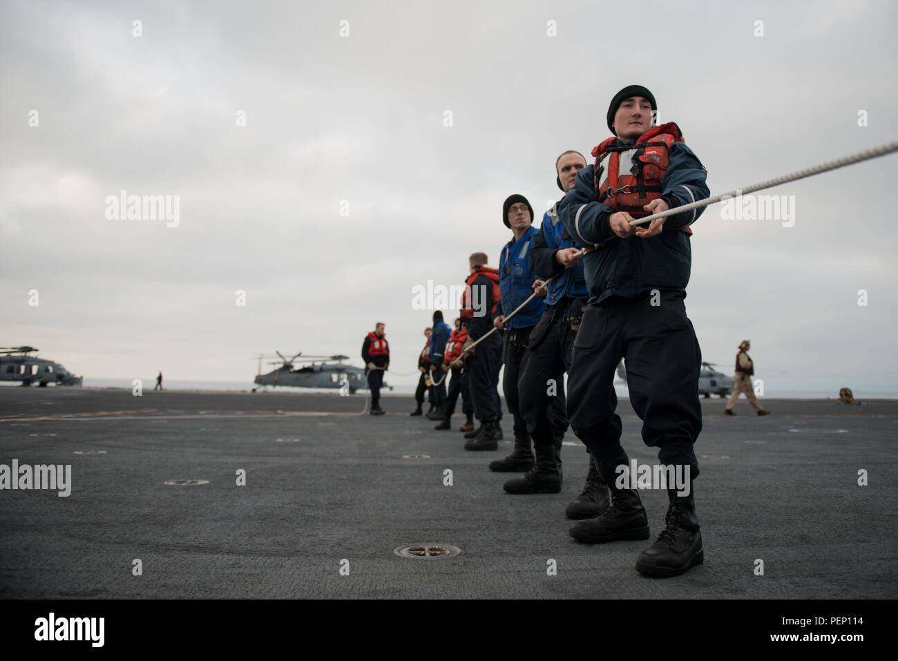 160121-N-BR087-047 PACIFIC OCEAN (Jan. 21, 2016) - Seaman Caleb Beckner ...