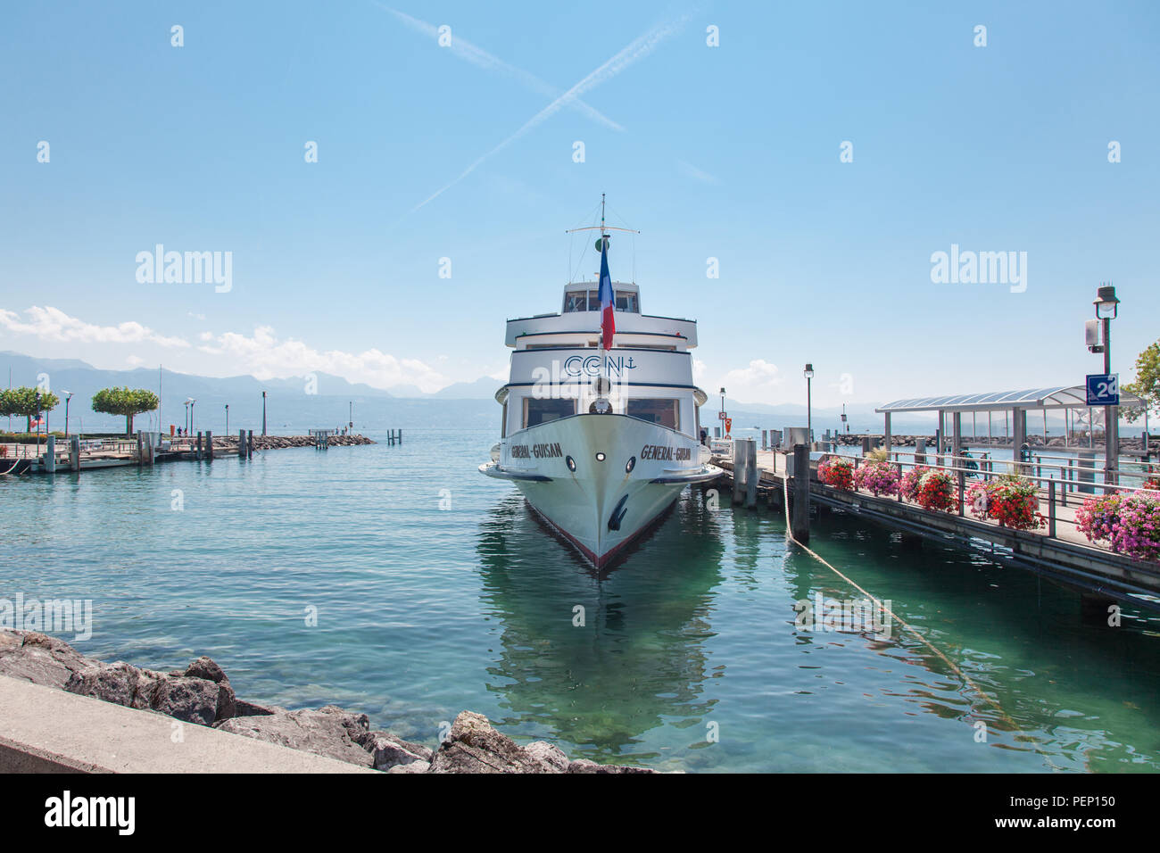 Landscape view of modern CGN boat navigating on Lake Leman (Geneva Lake) docked in Lausanne Ouchy port, Switzerland on sunny summer day Stock Photo