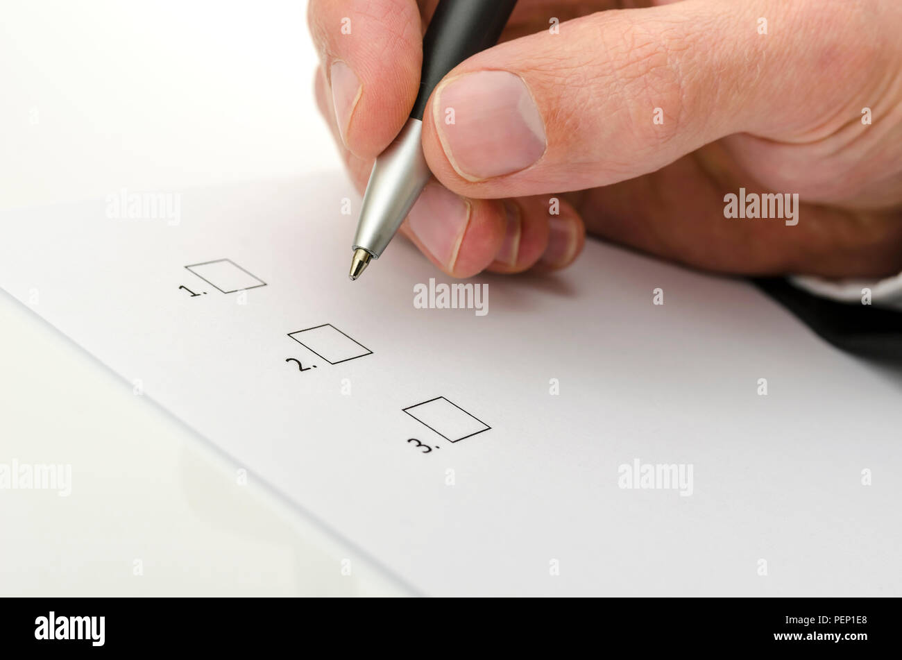 Detail of business man hand choosing one of the options Stock Photo - Alamy