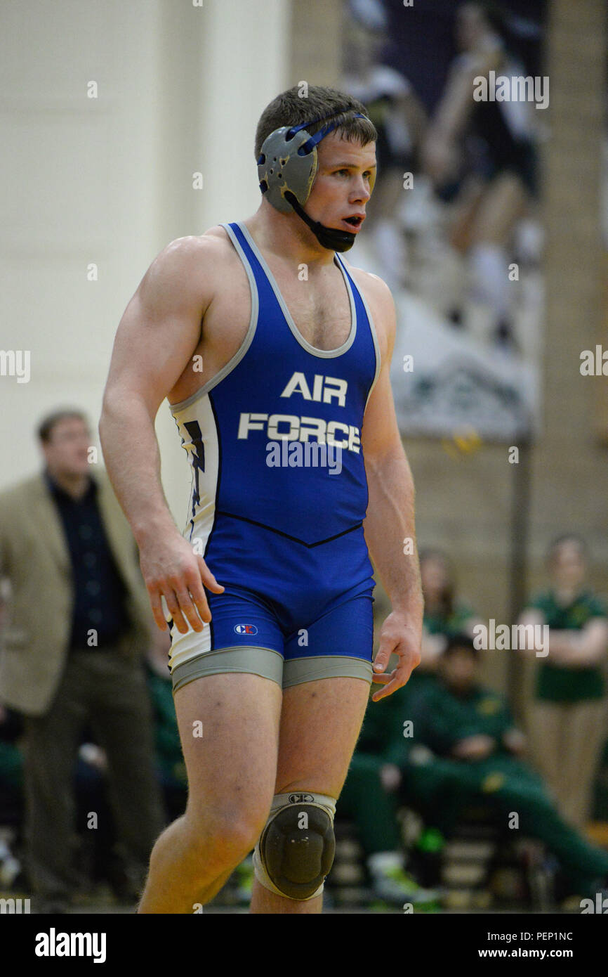 U.S. Air Force Academy cadet Parker Hines, looks to his coaches for advice during a pause of his