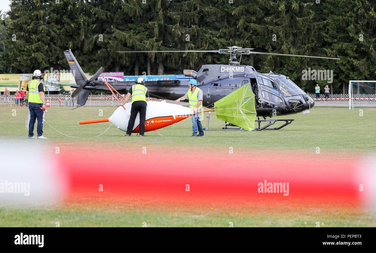 Geyer, Germany. 17th Aug, 2018. Technicians prepare a Supracon 