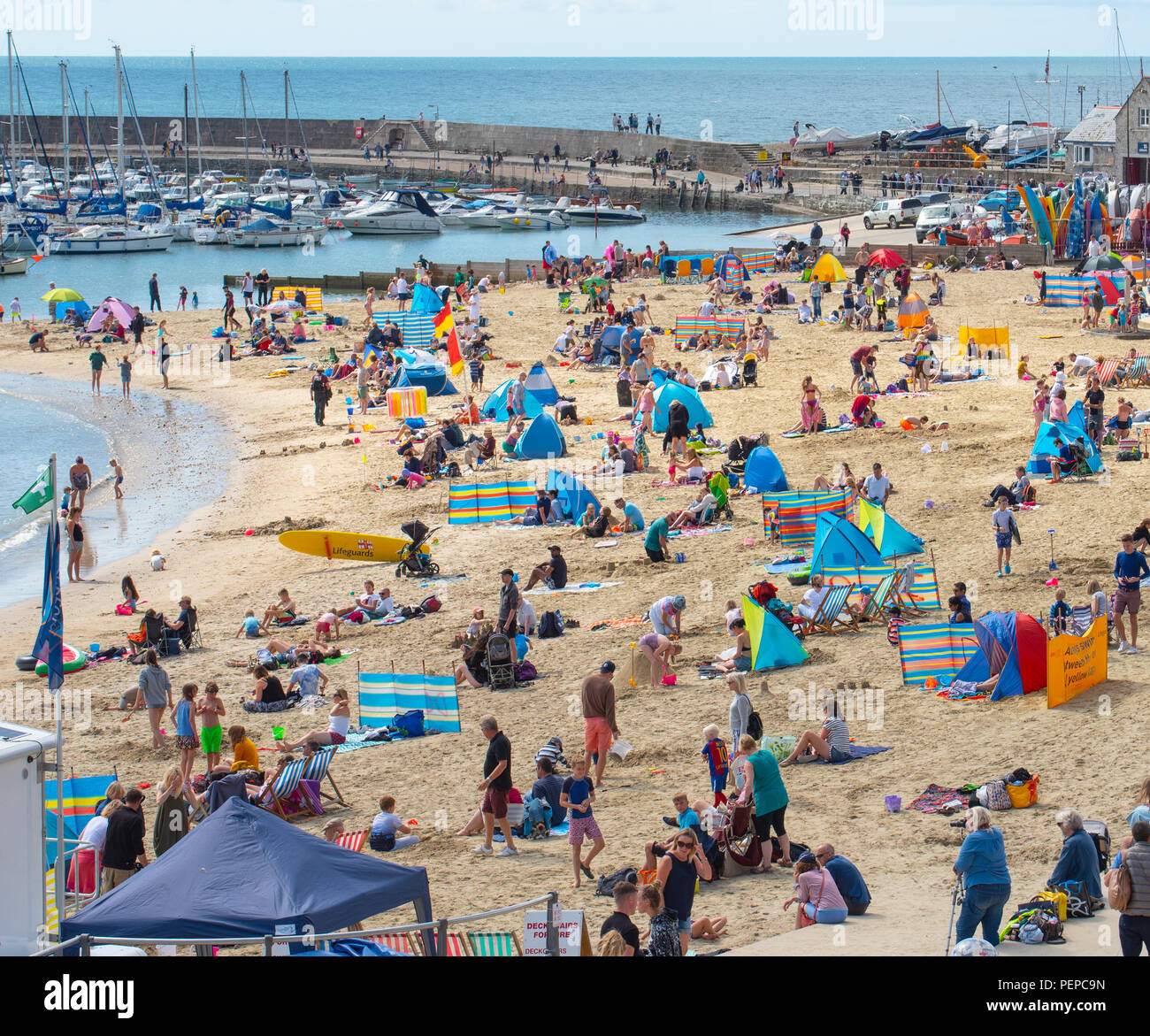 Crowded Beach Scene Lyme Regis High Resolution Stock Photography and ...