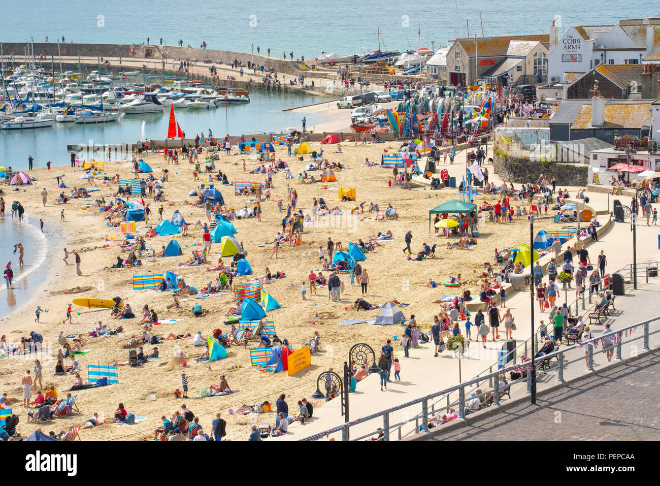 Crowded Beach Scene Lyme Regis High Resolution Stock Photography and ...