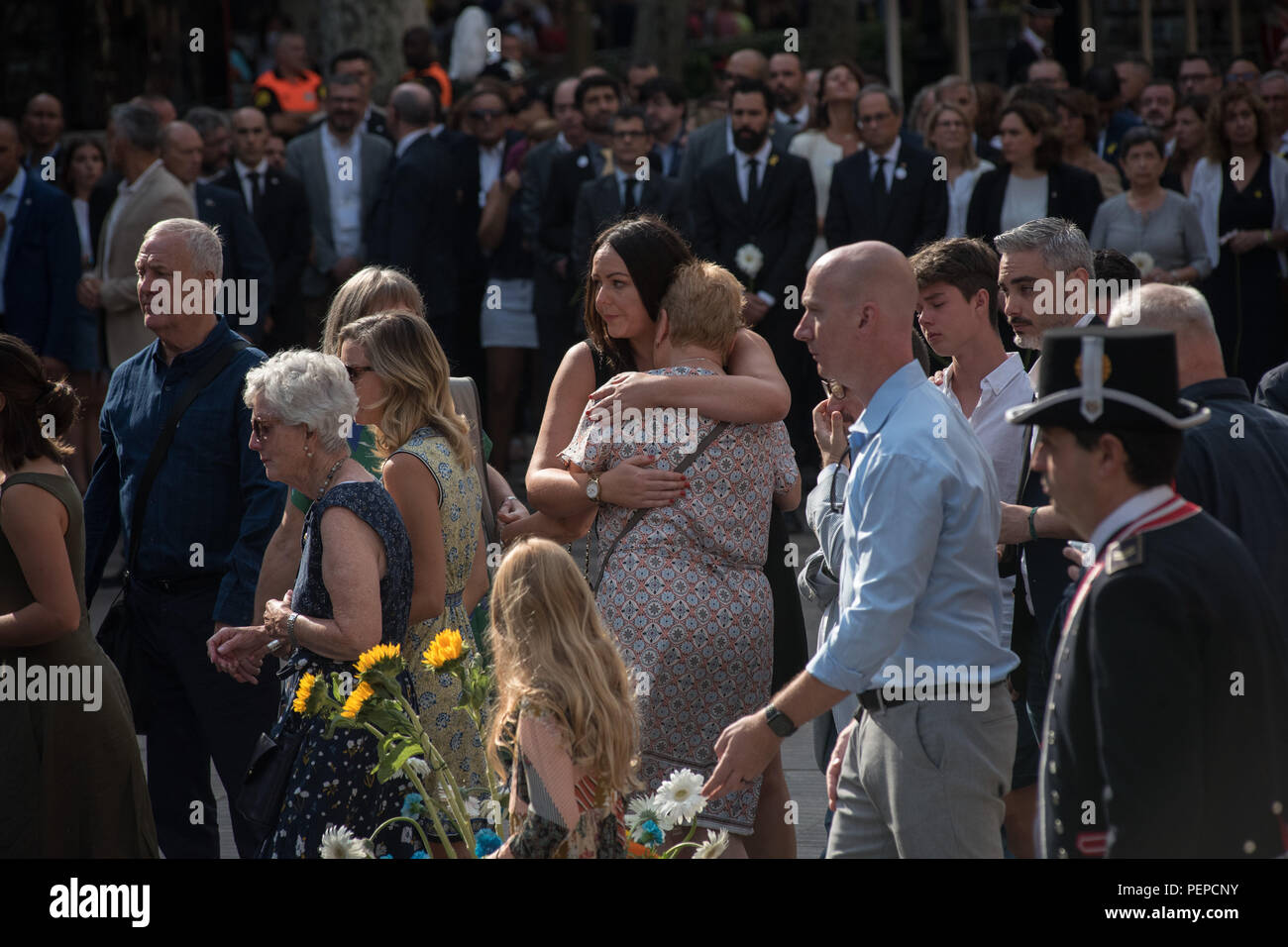 Barcelona, Catalonia, Spain. 17th Aug, 2018. Relatives of victims preceding local authorities pay tribute in Las Ramblas of Barcelona after one year of the terror attacks that killed 16 people and injured more than 120 when two vehicles crashed into the crowds in Barcelona and Cambrils. Credit: Jordi Boixareu/ZUMA Wire/Alamy Live News Stock Photo