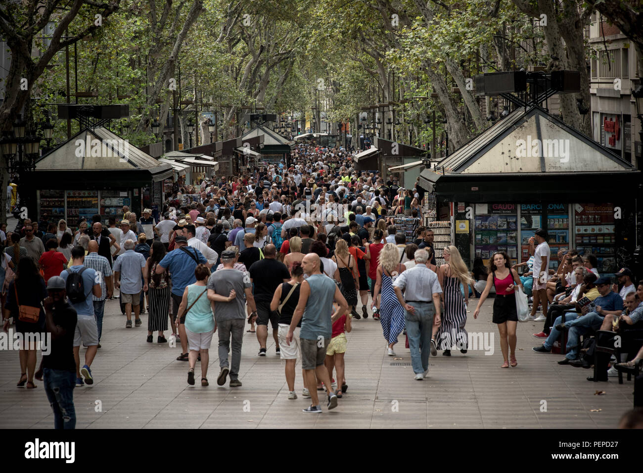 Barcelona, Spain. 17th Aug 2018. August 17, 2018 - Barcelona, Catalonia, Spain -  People walk  Las Ramblas of Barcelona during the first anniversary of  last year's terror attacks that  killed  16 people and injured more than 120  when two vehicles crashed into the crowds. Credit:  Jordi Boixareu/Alamy Live News Stock Photo