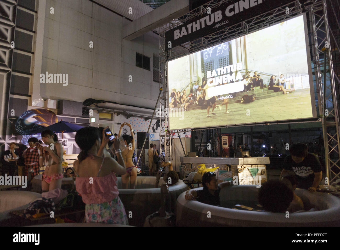 Tokyo Japan 17th Aug 18 People Gather To See A Movie In Small Inflatable Water Pools On The Rooftop Of The Revamped Magnet By Shibuya109 Building In Tokyo Bathtub Cinema Is Held