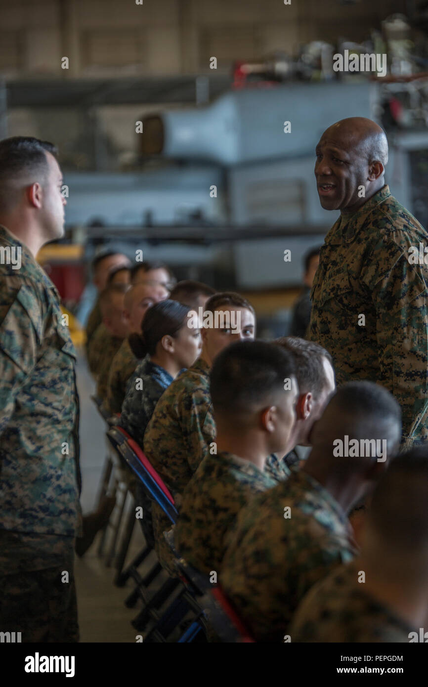 Sergeant Major of the Marine Corps, Sgt. Maj. Ronald L. Green, addressed Marines of Marine Aircraft Group 49, 4th Marine Aircraft Wing, at Naval Air Station Joint Reserve Base New Orleans, Jan. 19, 2016. Sgt. Maj. Green exchanged stories with the Marines about their time before the Corps and how they made the decision to become Marines. Green also commended Marines for their hard work, encouraged them to protect what they’ve earned as Marines, and emphasized the importance of upholding the standards of the Corps on and off duty. Stock Photo