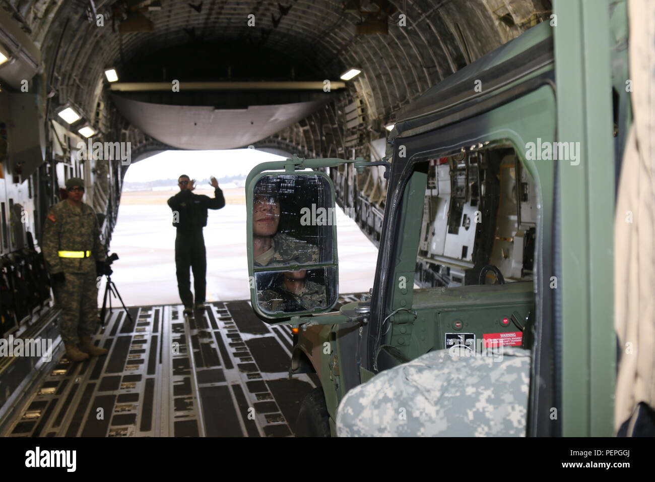 Spc. Steve Veal, a satellite communications technician with the I Corps ...