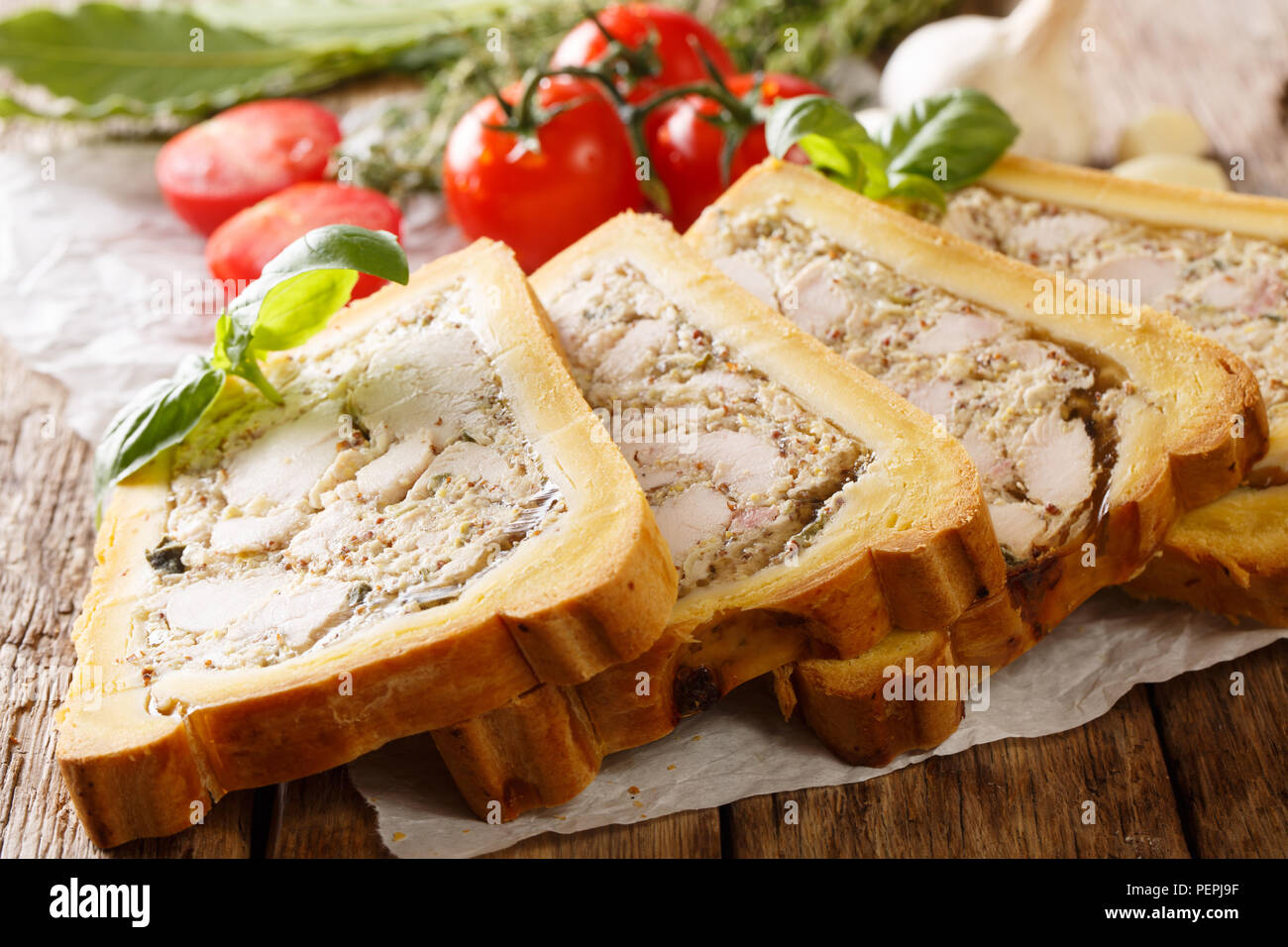 Delicious chicken terrine, jelly in bread with, spices and herbs close