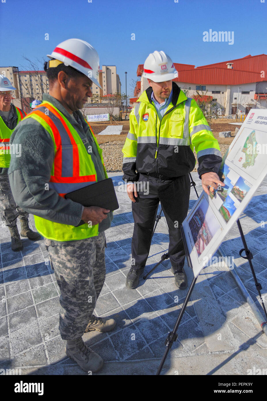 Usfk Command Engineer Col. Raymond A. Robinson, Jr., the USFK command chaplain, receives a ...