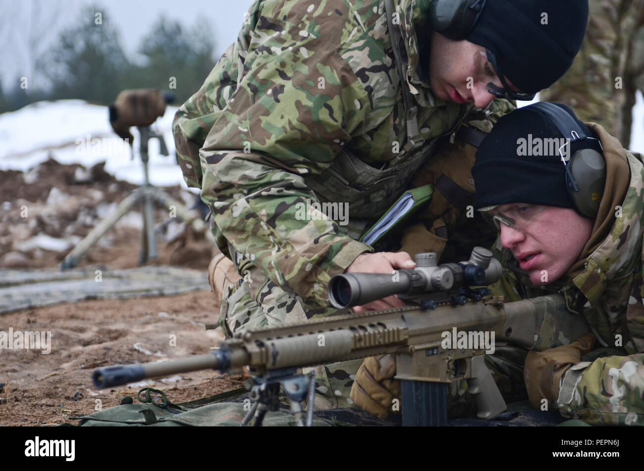 https://c8.alamy.com/comp/PEPN6J/sgt-john-zagozdon-prone-position-a-sniper-originally-from-st-augustine-fla-and-sgt-andrew-mendez-kneeling-a-senior-sniper-originally-from-san-antonio-both-with-3rd-squadron-2nd-cavalry-regiment-stationed-at-vilseck-germany-make-proper-adjustments-on-the-gunsight-of-an-m110-semi-automatic-sniper-system-sass-during-a-field-training-exercise-at-adazi-training-center-in-latvia-jan-27-2016-PEPN6J.jpg