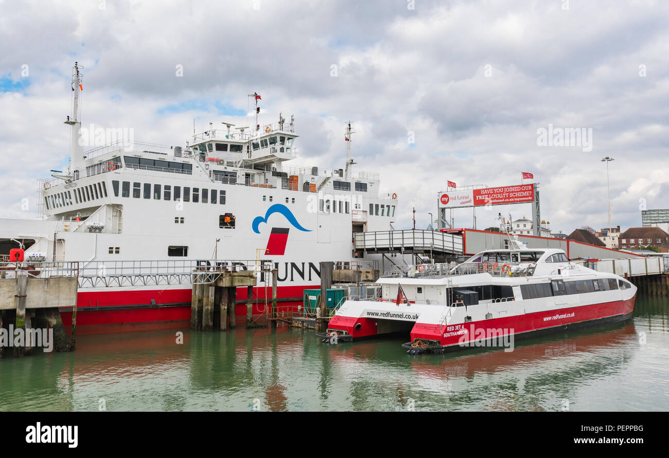 Red Funnel ferry boats - Red Jet 4 Catamaran ferry and Red Falcon vehicle ferry moored at Southampton docks in Southampton, Hampshire, England, UK. Stock Photo
