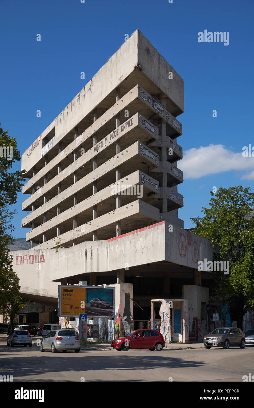 The derelict former Ljubljanska Bank in Mostar, Bosnia and Herzegovina, has been called the 'Sniper Tower' since the Balkans War in the 1990s. Stock Photo
