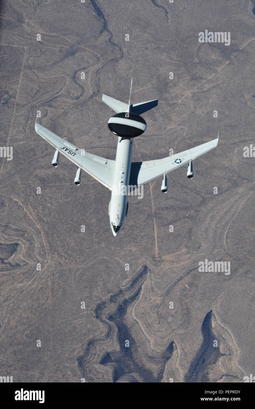 An E-3 Sentry Airborne Warning and Control System aircraft flown by the 552nd Air Control Wing at Tinker Air Force Base, Okla., descends following an aerial refueling with a 507th Air Refueling Wing KC-135R over Texas Jan. 19, 2016. (U.S. Air Force photo/Maj. Jon Quinlan) Stock Photo