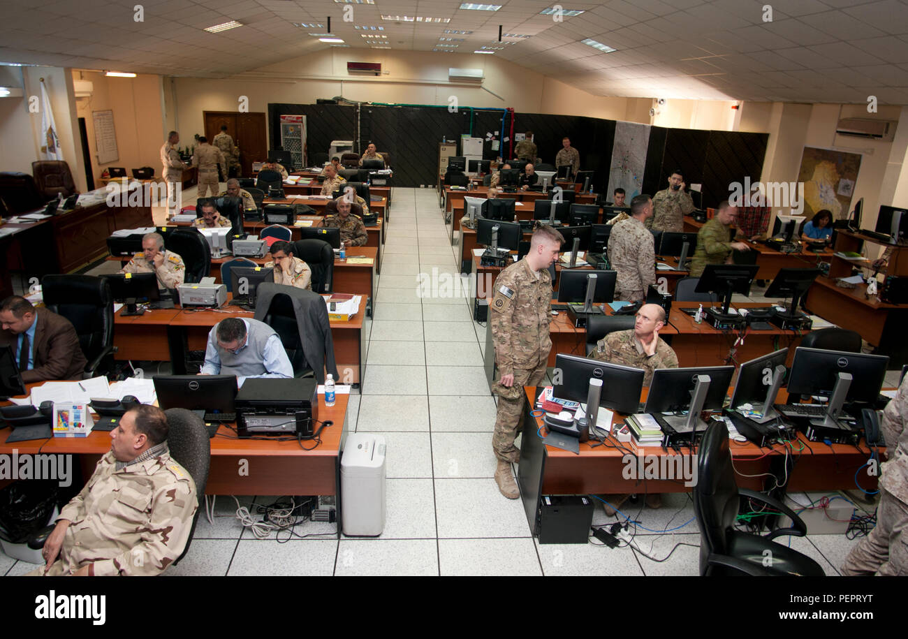 Iraqi and coalition service members work side by side in the new