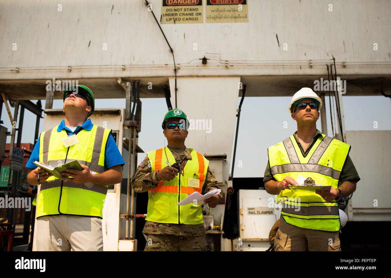 U.S. Marine Corps aviation ordnance chief and Army cargo specialists ...