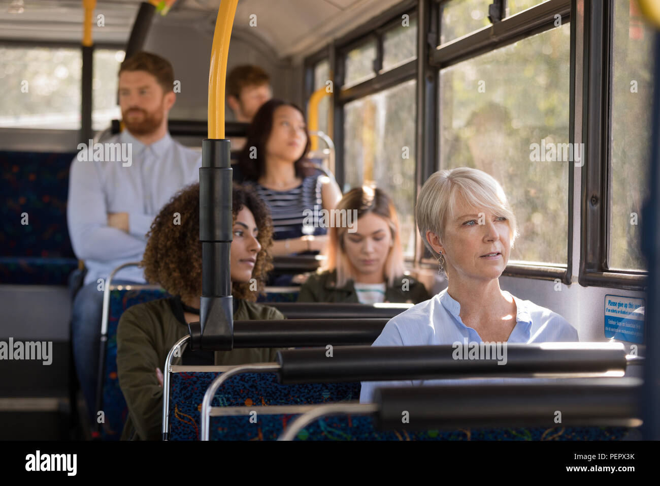 Commuters travelling in bus Stock Photo Alamy
