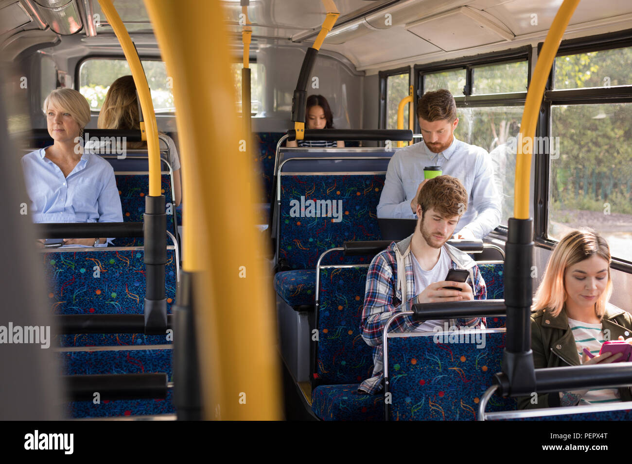 Commuters travelling in bus Stock Photo Alamy