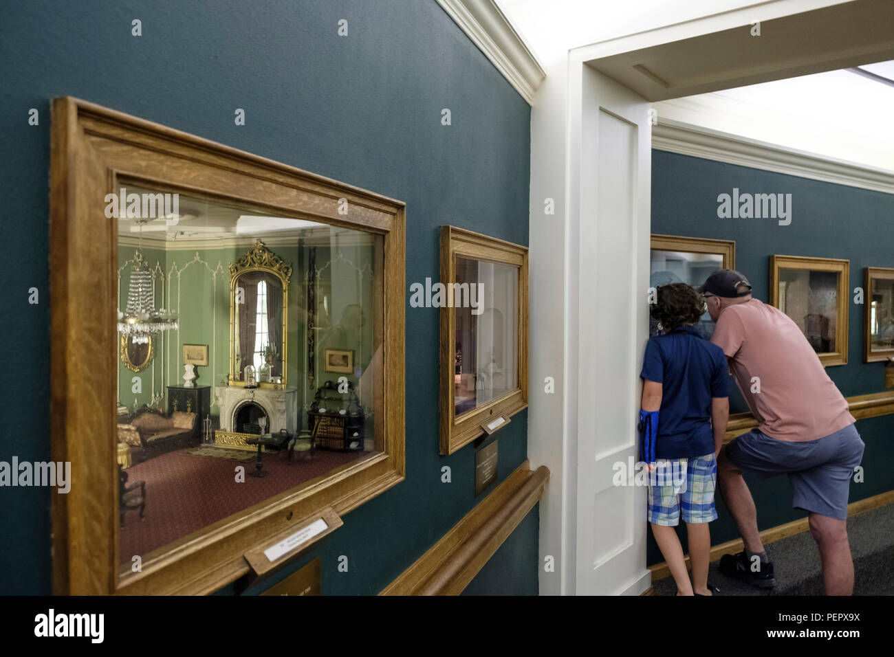 Family enjoying the Thorne Miniature Rooms,  Art Institute of Chicago, Chicago, Illinois USA Stock Photo