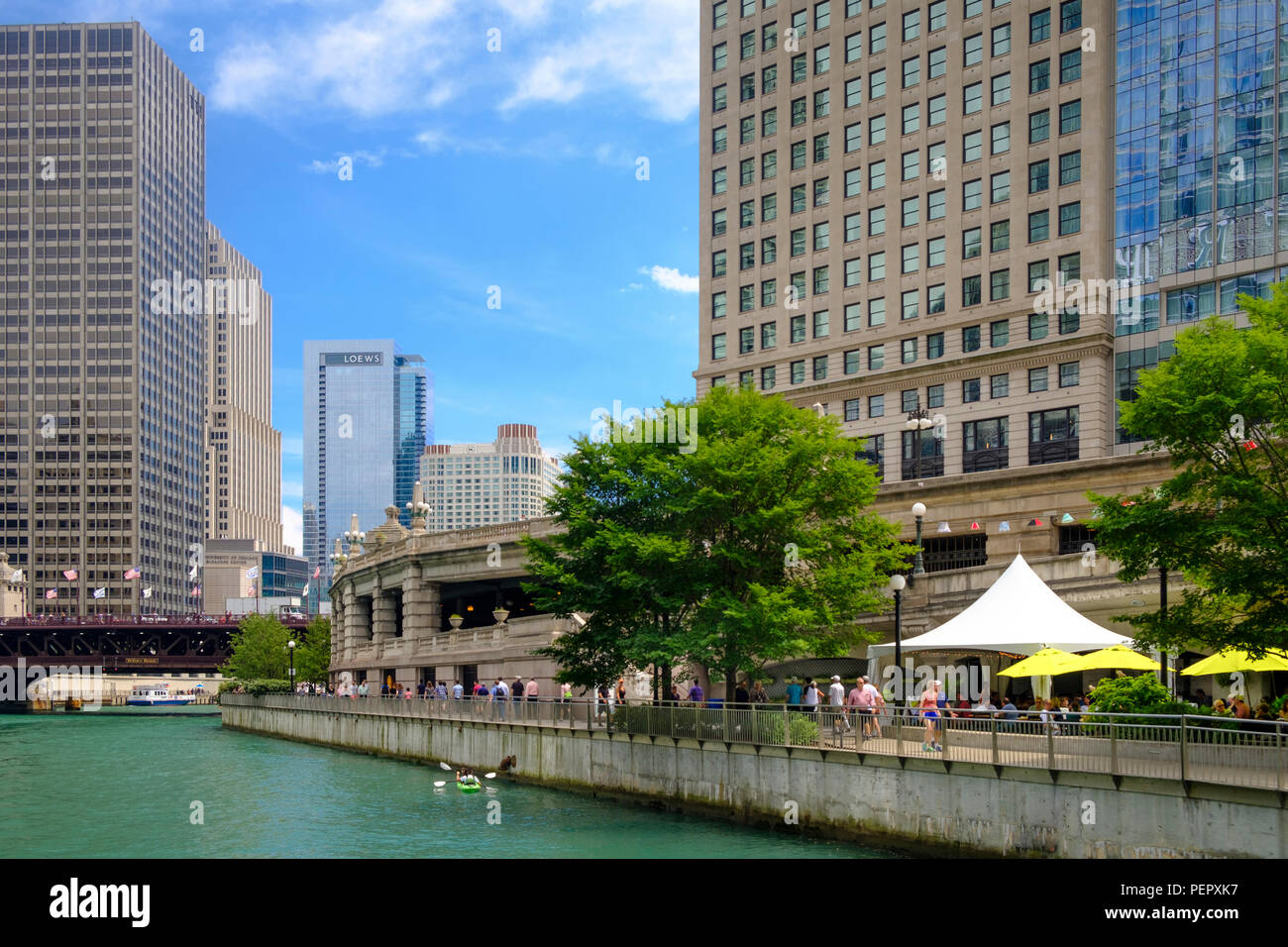 Chicago River with The Riverwalk and surrounding downtown architecture in summer, Chicago, Illinois, USA Stock Photo