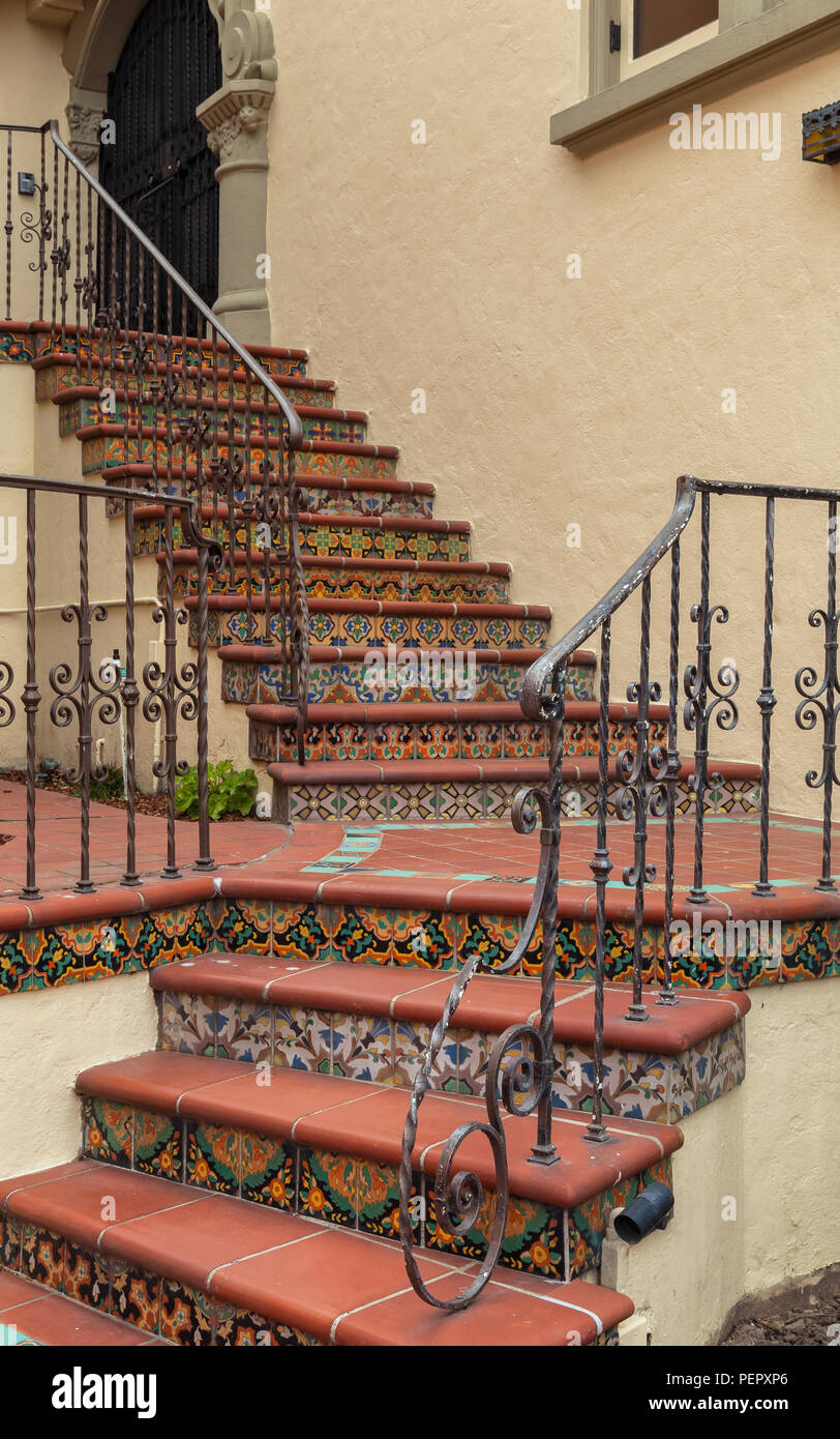 Floral red staircase lead into a home entrance in San Francisco, California, United States. Stock Photo