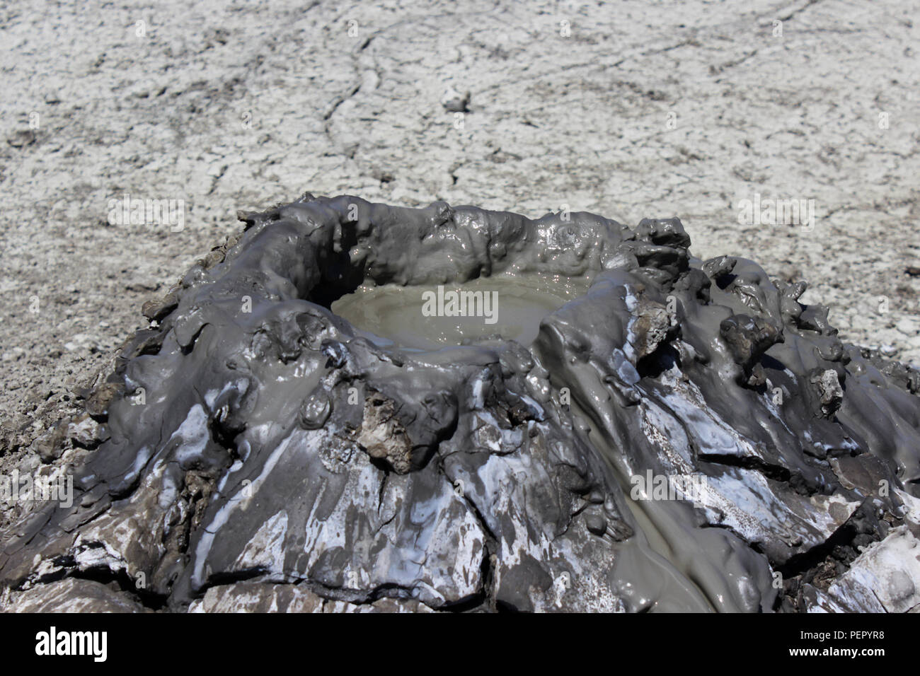 The top of a cold mud volcano, which is created as a result of the release of gas methane, nitrogen and carbon dioxide from the earth's interior. In t Stock Photo