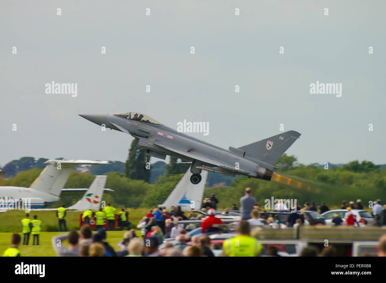 RAF Royal Air Force Eurofighter Typhoon F2 jet fighter plane of 29 Squadron at London Southend airport for the Southend Airshow. Taking off with crowd Stock Photo