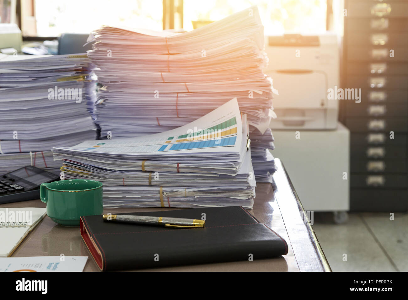 Close up of business documents stack on desk , report papers stack Stock Photo