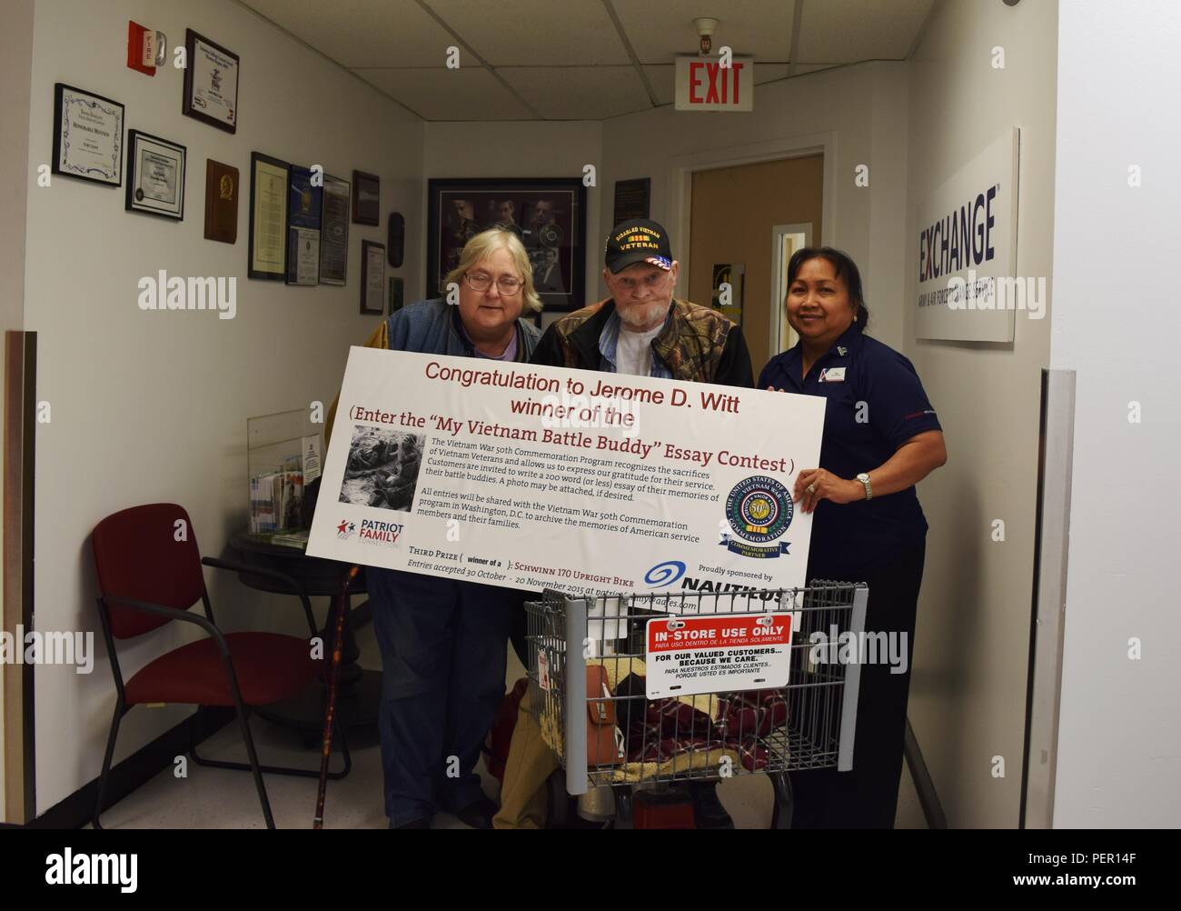 Jerome D. Witt, of Roy, Wash. (middle), is awarded a Schwinn 170
