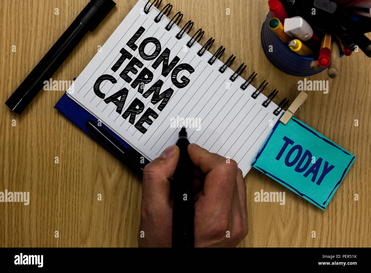 Writing note showing Long Term Care. Business photo showcasing