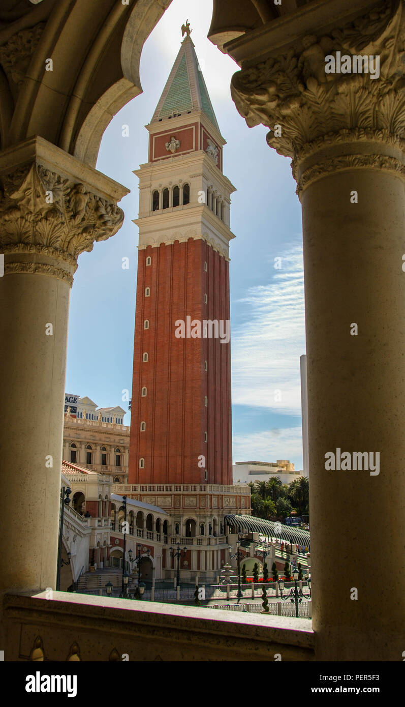 Replica of St Mark's Campanile (Bell Tower) at the Venetian Hotel in Las  Vegas framed by the pillars of a walkway to the hotel Stock Photo - Alamy